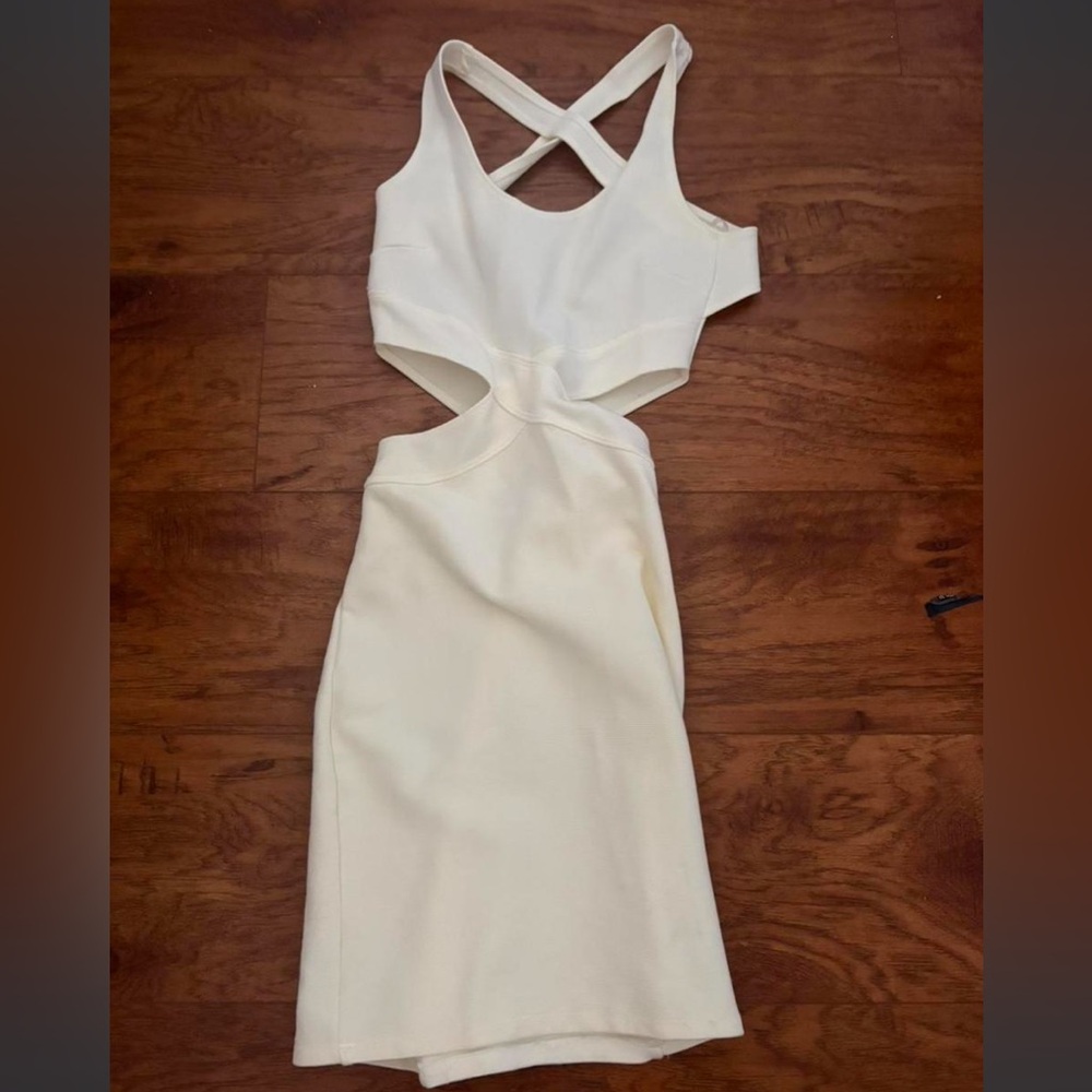 White bodycon midi dress with cutouts